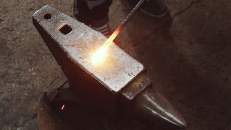 Close-Up-of-Hammering-Heated-Iron-on-Anvil